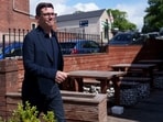 Andy Burnham walks during a campaign visit to the town of Ashton-in-Makerfield during the Makerfield by-election that he won last week.