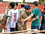 Candidates undergo frisking at an exam centre in Sector 19, Chandigarh. (Keshav Singh/HT)