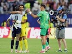 Uruguay's forward #09 Darwin Nunez greets Cape Verde's goalkeeper #01 Vozinha.(AFP)