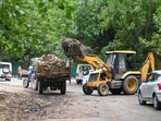 Gurugram, India-June 27, 2024: An MCG jcb machine cleaning the garbage at civil line area near Deputy commissioner residence, in Gurugram, India, on Thursday, 27 June 2024. (Photo by Parveen Kumar/Hindustan Times)(Pic to go with Debashish Karmakar's story)