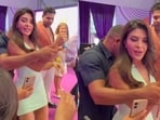 Jacqueline Fernandez bodyguard holds her wrist, stops her from clicking pictures with fans.