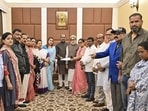 Lok Sabha Speaker Om Birla receiving a letter from TMC MPs for separate seating arrangement in the House. (PTI)
