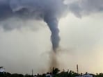 A tornado forms amid dark clouds, in Thoothukudi, Tamil Nadu, Sunday, June 21, 2026.