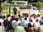 Teachers protesting on the PAU campus in Ludhiana on Monday. (HT Photo)