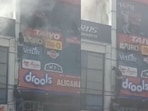 Videos from the scene showed firefighters and rescue personnel lowering stranded occupants to safety from upper floors. 