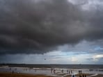 Dark clouds gather over Mumbai on Sunday. The India Meteorological Department (IMD) has forecast an increase in rainfall activity from Monday and said the southwest monsoon is likely to reach Mumbai by June 23.