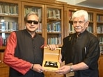 Congress MP Shashi Tharoor with J&K L-G Manoj Sinha
