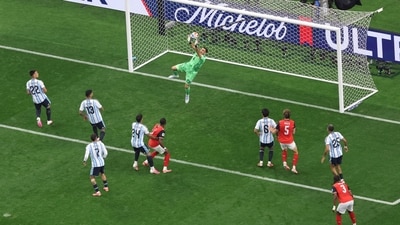One for the camera! Probably the hardest save he had to make in the entire game. Argentina goalkeeper Emiliano Martinez stops a ball from a free kick during the World Cup Group J match (AP Photo/Sam Hodde) One for the camera! Probably the hardest save he had to make in the entire game. Argentina goalkeeper Emiliano Martinez stops a ball from a free kick during the World Cup Group J match (AP Photo/Sam Hodde)
