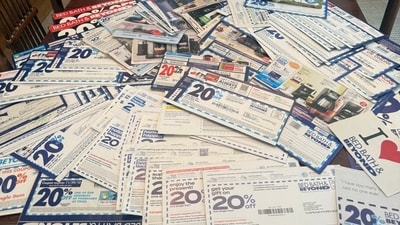 Some of Mary Tierney's 125 expired coupons. Some of Mary Tierney's 125 expired coupons.