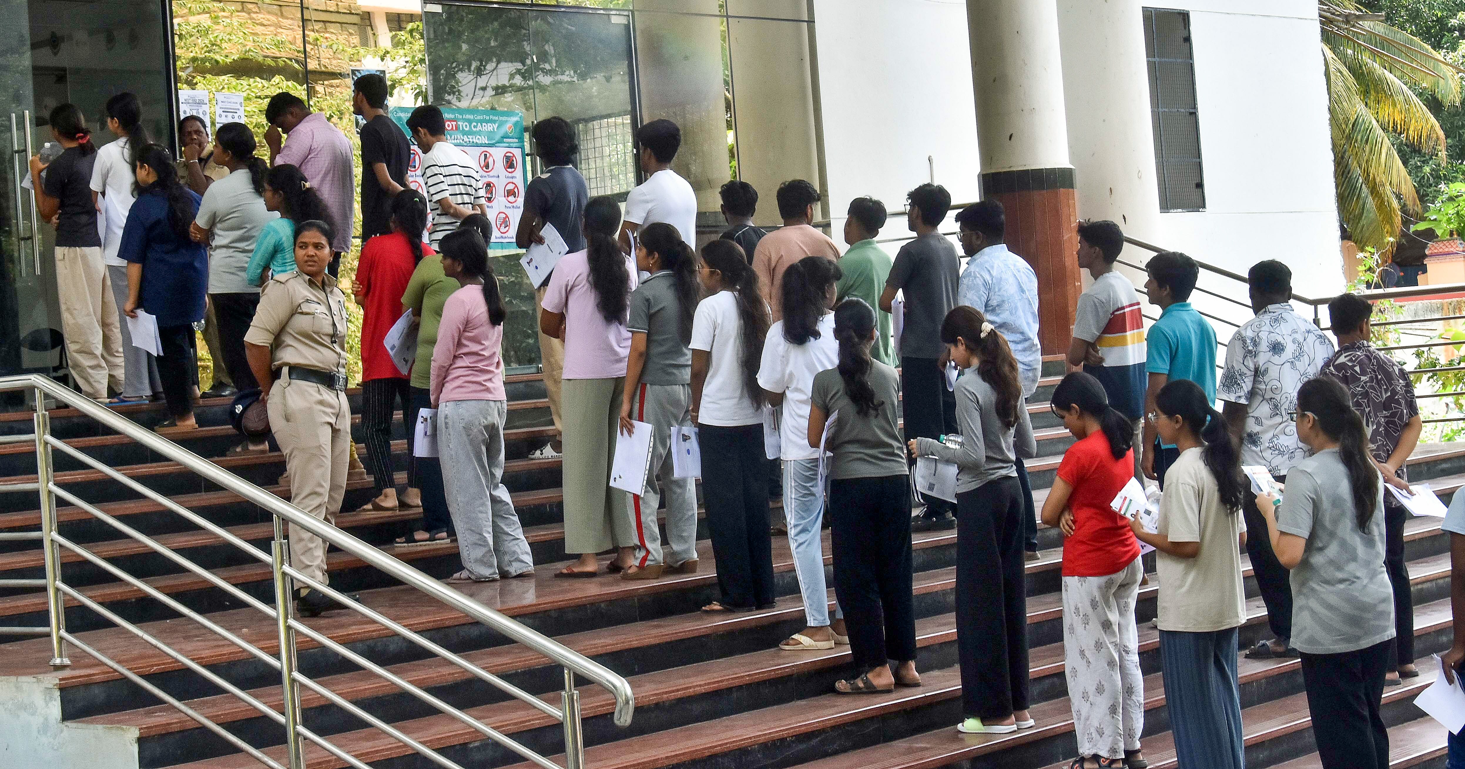 Aspirants undergo security check as they enter the examination hall for the NEET-UG-2026 re-exam, in Bengaluru on Sunday. (Photo for representation) (ANI) Aspirants undergo security check as they enter the examination hall for the NEET-UG-2026 re-exam, in Bengaluru on Sunday. (Photo for representation) (ANI)