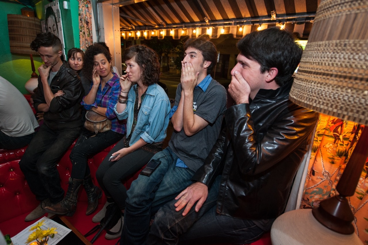 Daniel Moraff, with both hands to his mouth, listening to a 2016 presidential debate. Daniel Moraff, with both hands to his mouth, listening to a 2016 presidential debate.