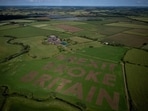 "Brexit broke Britain": Activists and political campaign group 'Led By Donkeys' mowed this message into a farmer’s field for the 10-year anniversary of Brexit, near Cricklade in Wiltshire.