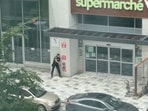 Police officers operate outside a supermarket amidst a deadly shooting incident, in Montreal, Quebec, Canada, June 22, 2026, in this still image obtained from a social media video. 