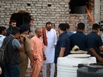 CM  Yogi Adityanath inspected the spot where the fire incident took place on the commercial building housing an animation centre in Lucknow on Monday (Deepak Gupta/Hindustan Times)