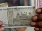 FILE PHOTO: A cashier checks Indian rupee notes inside a room at a fuel station in Ahmedabad, India, September 20, 2018. REUTERS/Amit Dave (REUTERS)