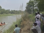 His family has alleged that the 23-year-old had gone to meet a 35-year-old woman whom he was acquainted with near the canal and that she had pushed him into the canal, near Masuri. (HT Photos)