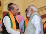 Prime Minister Narendra Modi with Dinesh Trivedi during a rally in Kolkata. 