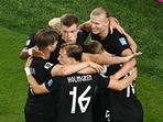 Norway's Erling Haaland celebrates scoring their second goal with teammates 