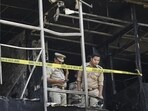 The Special Investigation Team (SIT) and Lucknow Police at the site on Tuesday for an investigation into the fire at the three-story commercial building in Lucknow’s Aliganj area that killed 15 people. (Deepak Gupta/HT Photo)