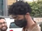 Pranit More was seen wearing a mask as he entered the NCW office on June 22.