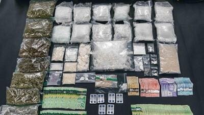 Drugs and cash recovered during an operation that led to the removal of two Indian nationals and the arrest of a third. (Credit: SPS) Drugs and cash recovered during an operation that led to the removal of two Indian nationals and the arrest of a third. (Credit: SPS)