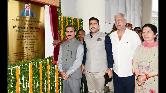 Himachal chief minister Sukhvinder Singh Sukhu with public works department minister Vikramaditya Singh on Tuesday. (Deepak Sansta/ht)