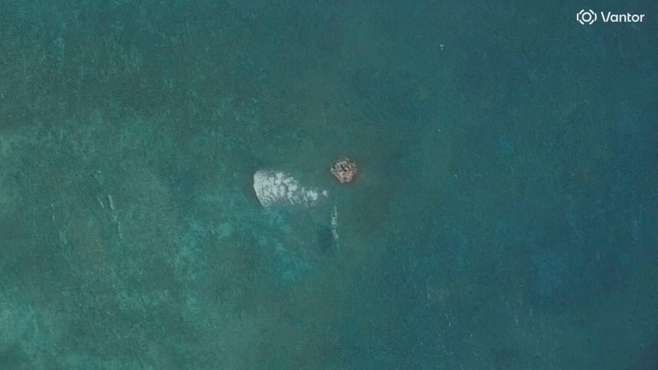 A satellite image shows the platform at the opening to Scarborough Shoal. A satellite image shows the platform at the opening to Scarborough Shoal.