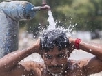 A man bathes under a water tap to relieve himself from the heat on a hot summer day, in Prayagraj on Wednesday. (PTI) A man bathes under a water tap to relieve himself from the heat on a hot summer day, in Prayagraj on Wednesday. (PTI)