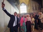 Andy Burnham with colleagues from the Parliamentary Labour Party in Westminster Hall at the Houses of Parliament in central London, as he returns to the House of Commons to take up his seat after winning the Makerfield by-election, Monday June 22
