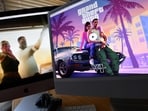 This illustration photo created in Los Angeles, California, on December 5, 2023, shows Rockstar Games� Grand Theft Auto 6 trailer played on computer screens.