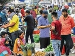 Fencing has been installed around key parking areas, and overhead barricades are being introduced to streamline the chaotic flow of vehicles entering and exiting the mandi. (Keshav Singh/HT)