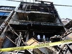 Forensic Science Laboratory (FSL) and Special Investigation Team (SIT) members are on site for an investigation in Lucknow. (HT)