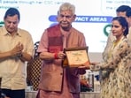 Jammu and Kashmir LG Manoj Sinha and agriculture ministerJavid Ahmad Dar (L) during the inauguration of ‘Seva se Samriddhi’ regional workshop on panchayat-led service delivery in Srinagar on Tuesday. (PTI)