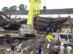 Kolkata: People gather after a three-storey under-construction warehouse collapsed in the Taratala area, in Kolkata, West Bengal. (PTI)