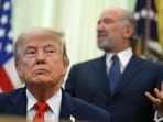 Commerce Secretary Howard Lutnick speaks before President Donald Trump, in foreground, in the Oval Office of the White House. (AP Photo/Jacquelyn Martin)