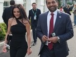 FBI director Kash Patel and Alexis Wilkins arrive at the White House ahead of the UFC Freedom 250 on the South Lawn, Sunday, June 14, 2026, in Washington. (AP Photo/Alex Brandon)