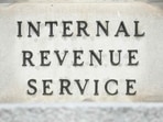 Paper Social Security checks are going away. (Photo by Jim WATSON / AFP)