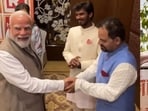 Actors Durgesh Kumar and Ashok Pathak with Prime Minister Narendra Modi during their meet in New Delhi and (inset) still from OTT series Panchayat