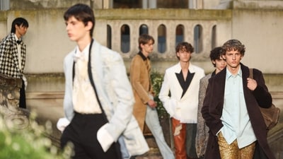 Models present creations for Dior for the Menswear Spring/Summer 2027 collection fashion show as part of the Paris Fashion Week, in Paris on June 24, 2026. (Photo by Charlotte SIEMON / AFP) (AFP)