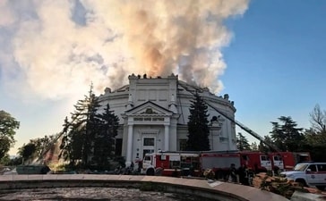 FILE - In this photo provided by Sevastopol Mayor Mikhail Razvozhaev's Telegram channel on Wednesday, June 10, 2026, firefighters put out a blaze after a Ukrainian drone hit a building housing a panoramic painting that depicts the defense of the city during the 19th century Crimean War in Sevastopol, Crimea. (AP) FILE - In this photo provided by Sevastopol Mayor Mikhail Razvozhaev's Telegram channel on Wednesday, June 10, 2026, firefighters put out a blaze after a Ukrainian drone hit a building housing a panoramic painting that depicts the defense of the city during the 19th century Crimean War in Sevastopol, Crimea. (AP)