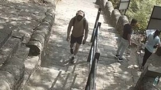 Chetan Chaudhary seen wearing a hoodie in the CCTV footage at the foothills of Lohagad on June 18. (Sourced)