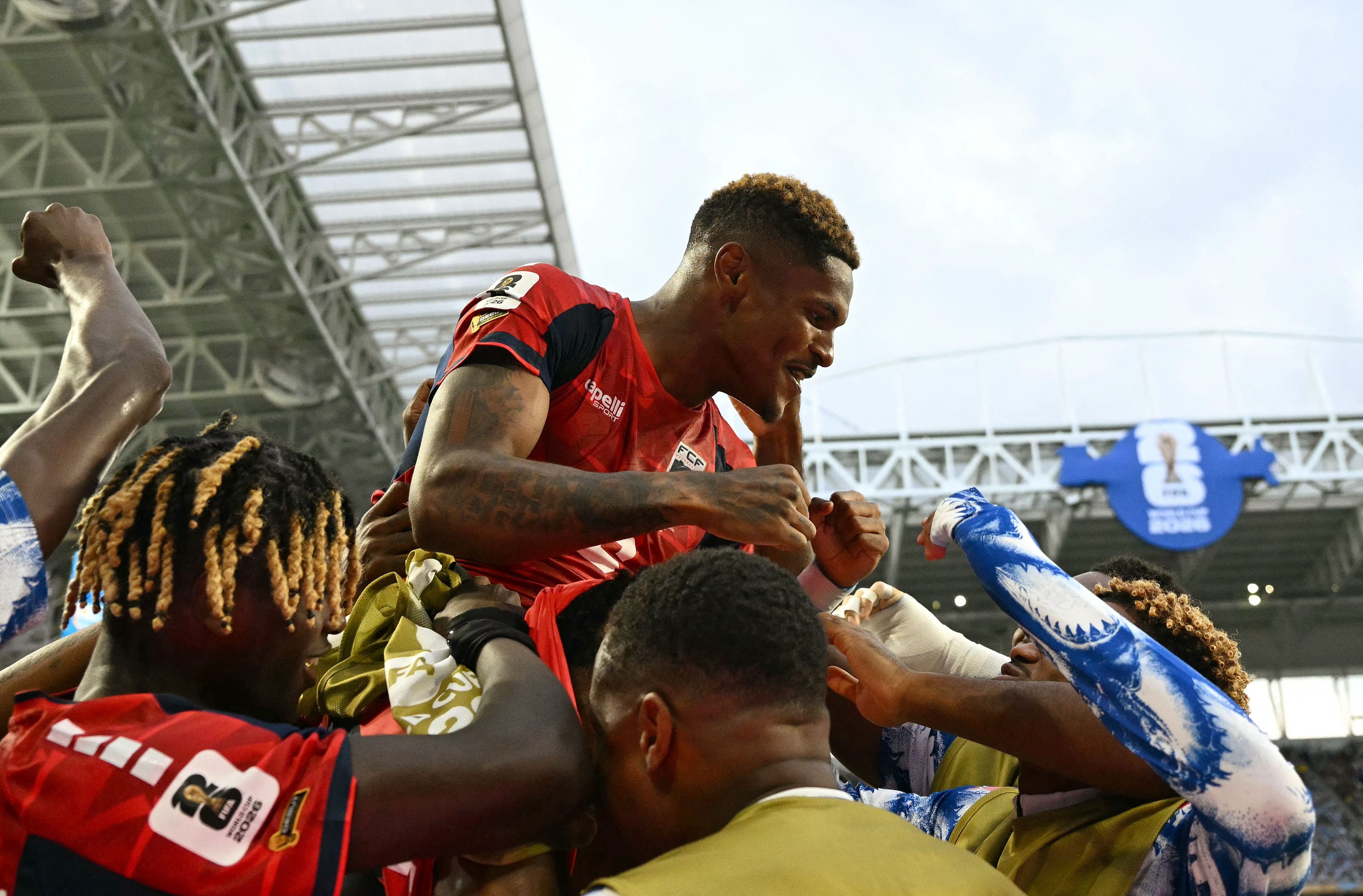 Cape Verde's forward #26 Helio Varela celebrates with teammates after scoring his team's second goal during the 2026 World Cup Group H match (AFP)
