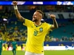 Brazil's Neymar celebrates after the World Cup Group C soccer match against Scotland in Miami Gardens. 