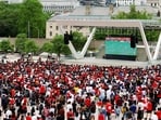 Fans watch Switzerland vs Canada football World Cup match on a big screen in Toronto, Canada, on Wednesday. (REUTERS)