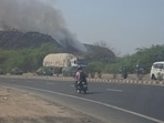 Fire department officials said that they controlled the blaze by 1 pm. Two fire tenders were deployed and firefighters used 40 water tankers to control the blaze. (HT)