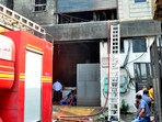 It took nearly around 18 hours and at least 200 fire tenders to douse the raging blaze. (Gurpreet Singh/HT)