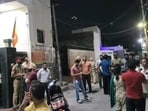 People gathered outside the clinic owned by a homoeopathic practitioner couple associated with the BJP in Bathinda’s Vishal Nagar after the blast on June 22. A scooter was damaged in the incident. (HT file photo)
