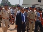 Retired high court judge Vinod Kumar Singh reaches at Bilauti village, Bhojpur district, and started judicial inquiry into encounter death of Bharat Bhushan Tiwari on Thursday. (HT Photo)