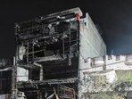 The fire-ravaged building in Lucknow’s Aliganj. (PTI PHOTO)