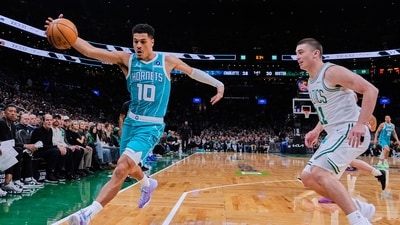 Charlotte Hornets guard Josh Green (10) grabs a loose ball against Boston Celtics guard Payton Pritchard (11) during the first half of a NBA basketball game, April 7, 2026, in Boston. (AP) Charlotte Hornets guard Josh Green (10) grabs a loose ball against Boston Celtics guard Payton Pritchard (11) during the first half of a NBA basketball game, April 7, 2026, in Boston. (AP)